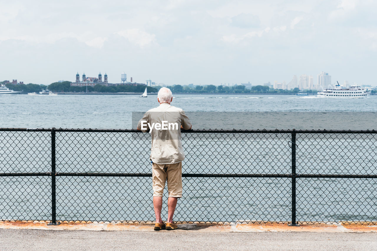 Old man at promenade in governors island