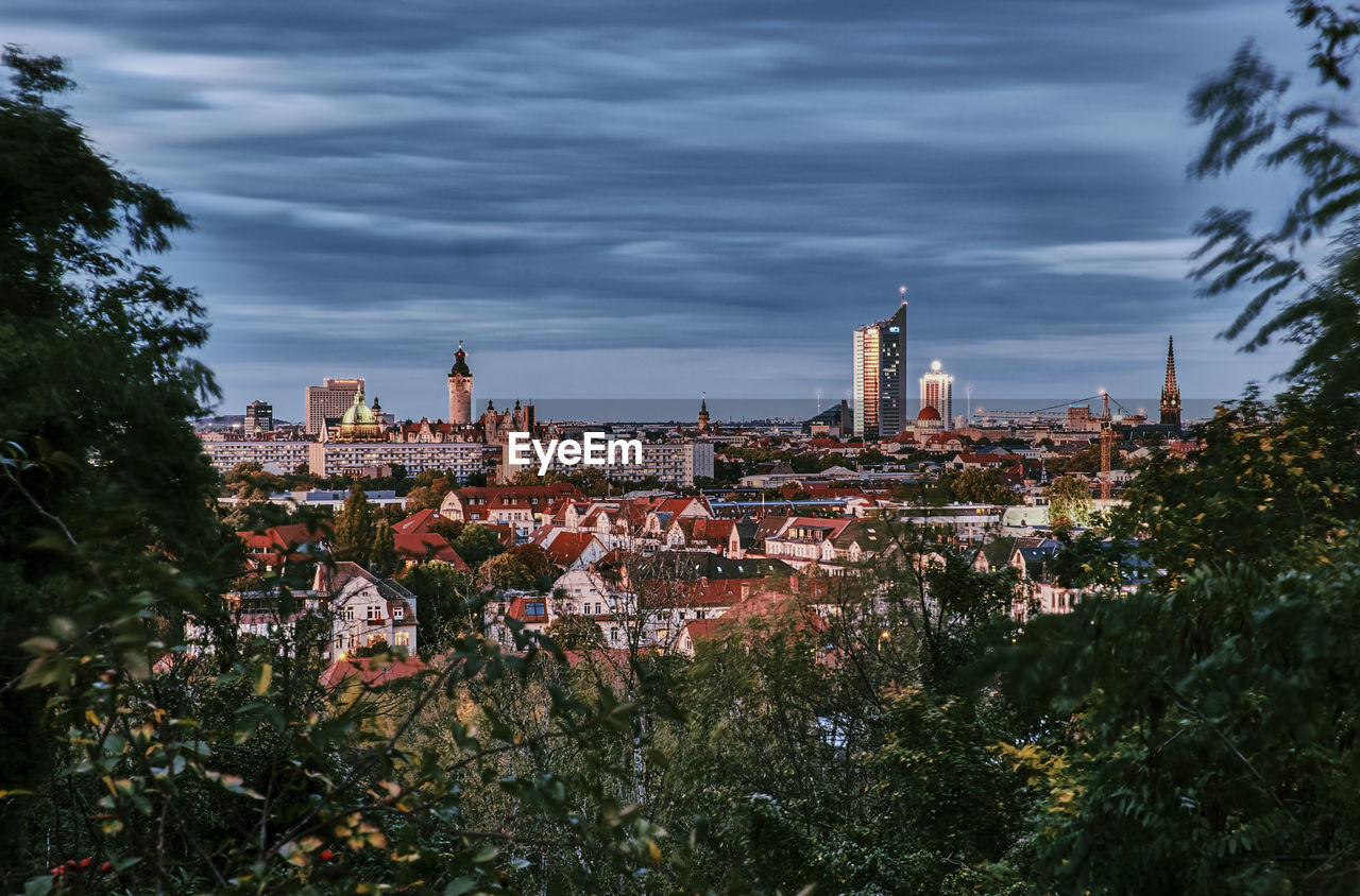 High angle view of illuminated cityscape against sky