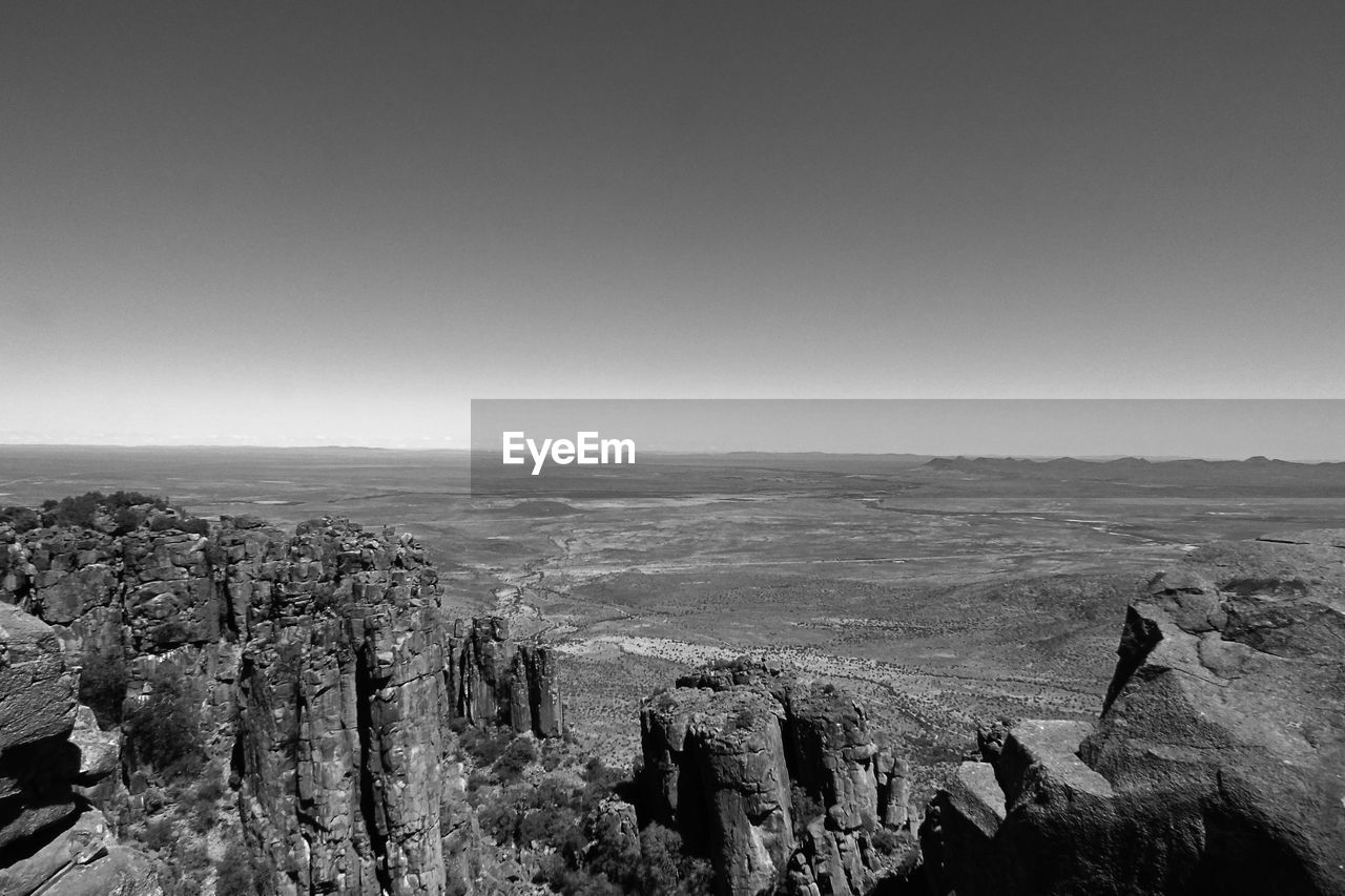 SCENIC VIEW OF ROCKY MOUNTAINS AGAINST SKY