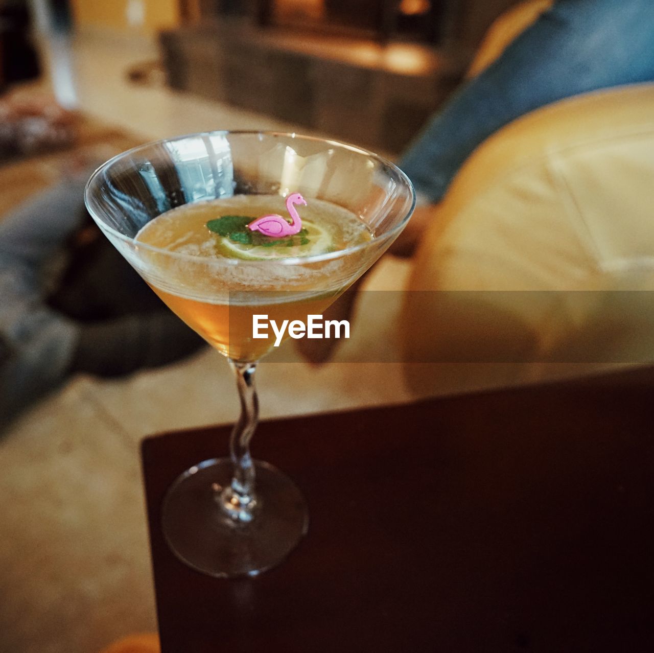 CLOSE-UP OF BEER GLASS ON TABLE IN RESTAURANT