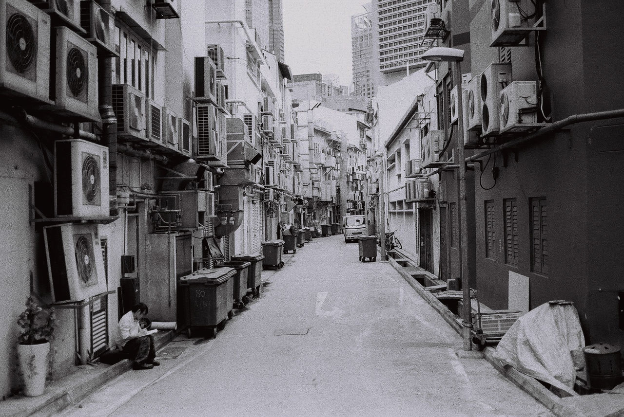 NARROW STREET ALONG BUILDINGS