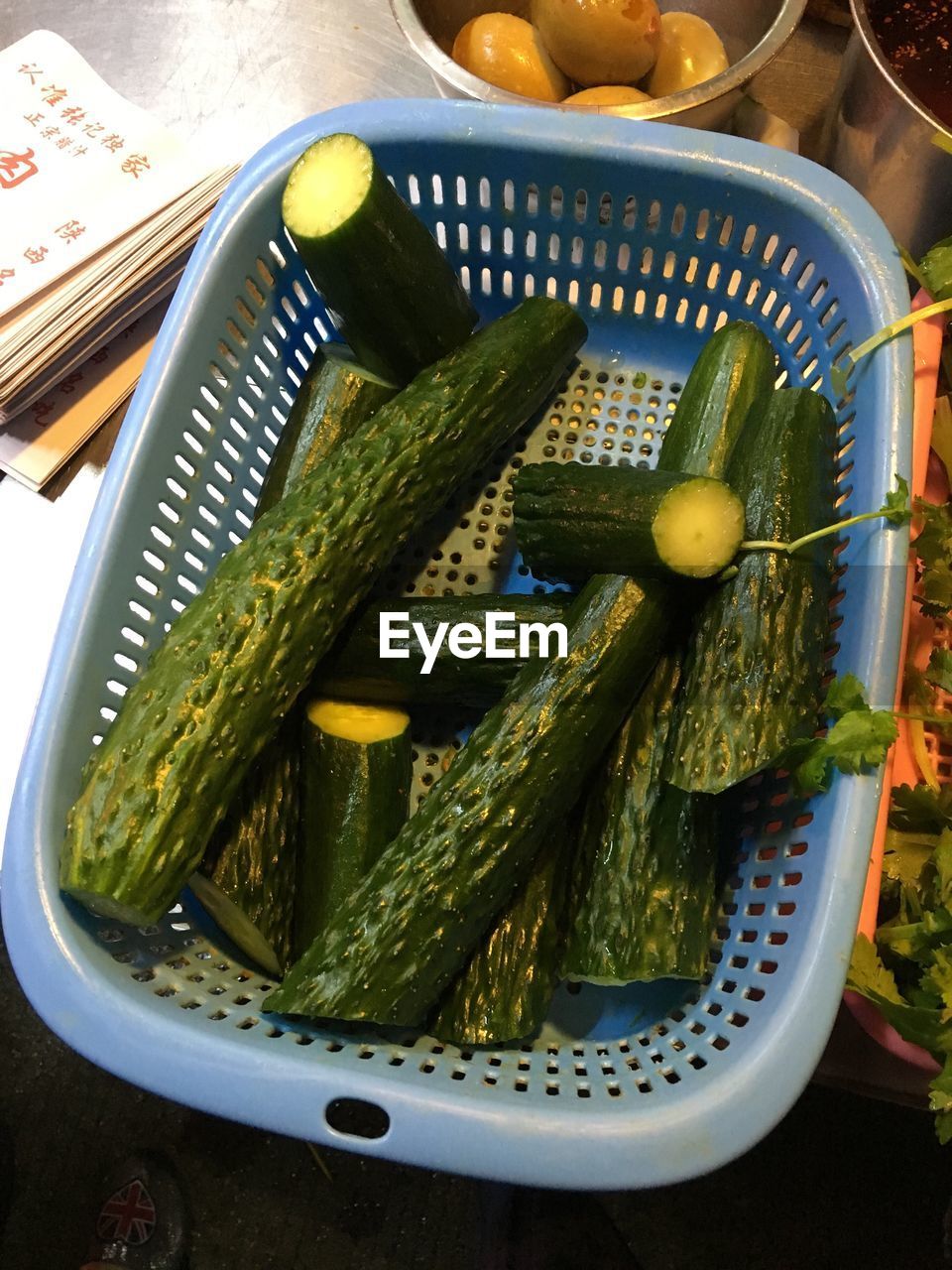 Cucumbers in basket at home