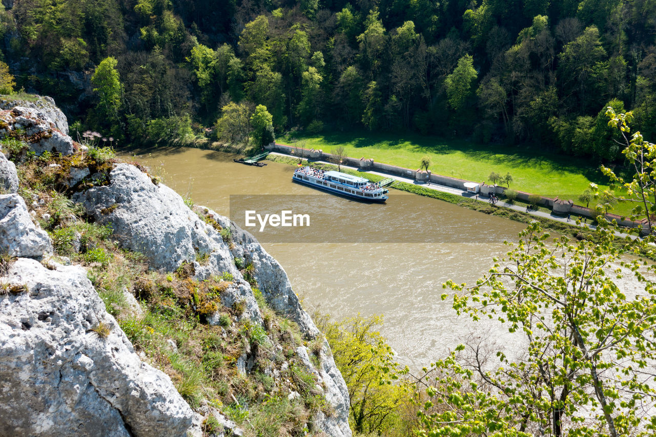 Scenic view of river in forest against sky