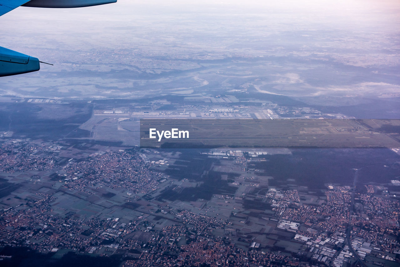 AERIAL VIEW OF CITYSCAPE AND SKY