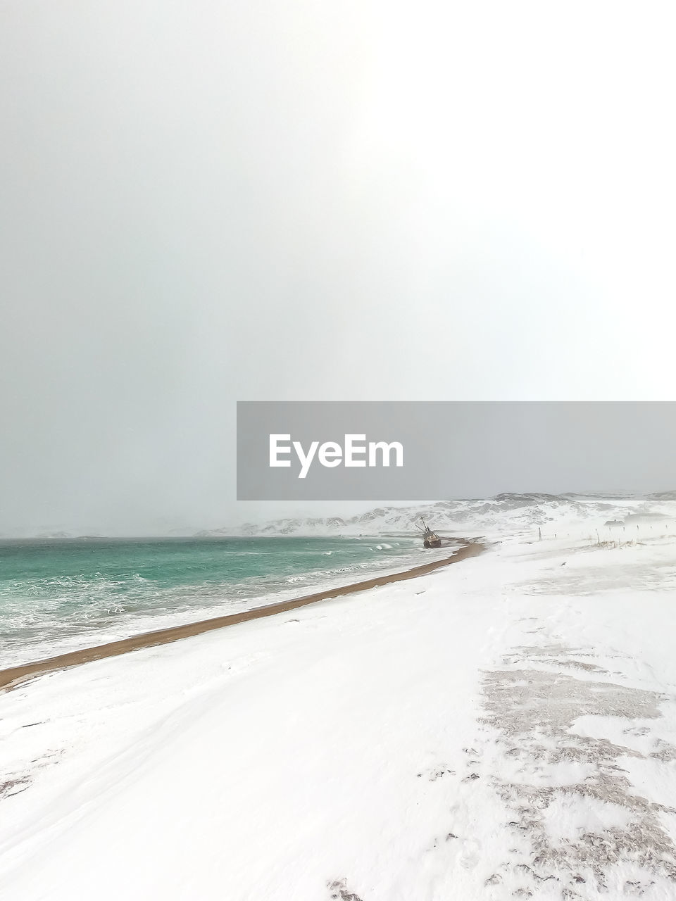 PANORAMIC VIEW OF BEACH AGAINST CLEAR SKY