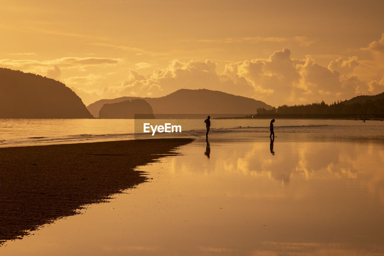 scenic view of sea against orange sky