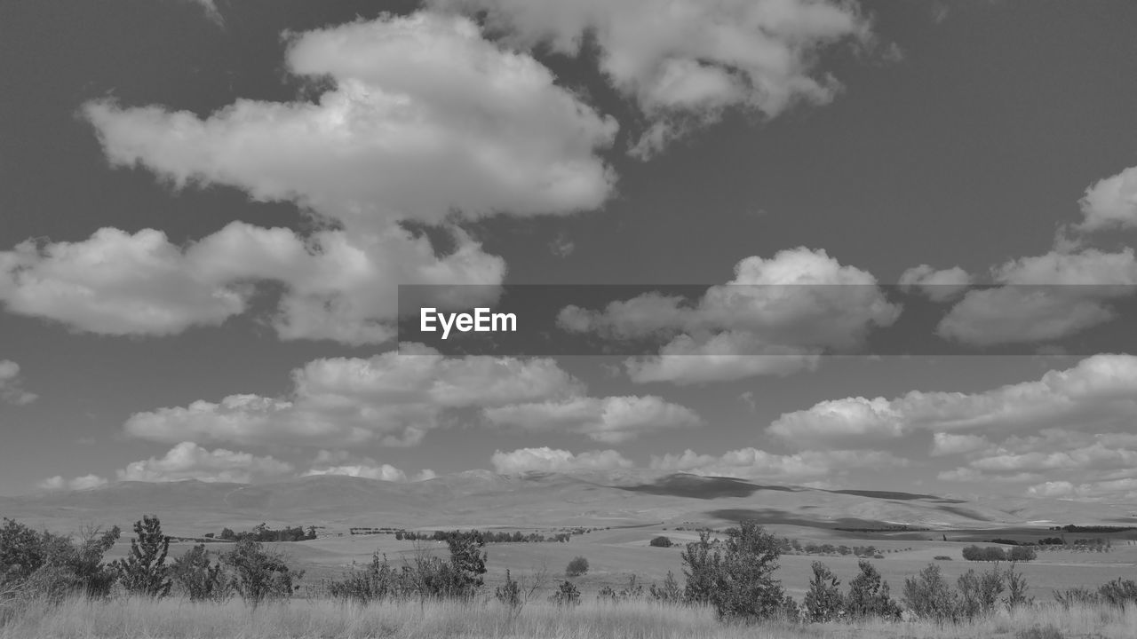 Scenic view of land against sky