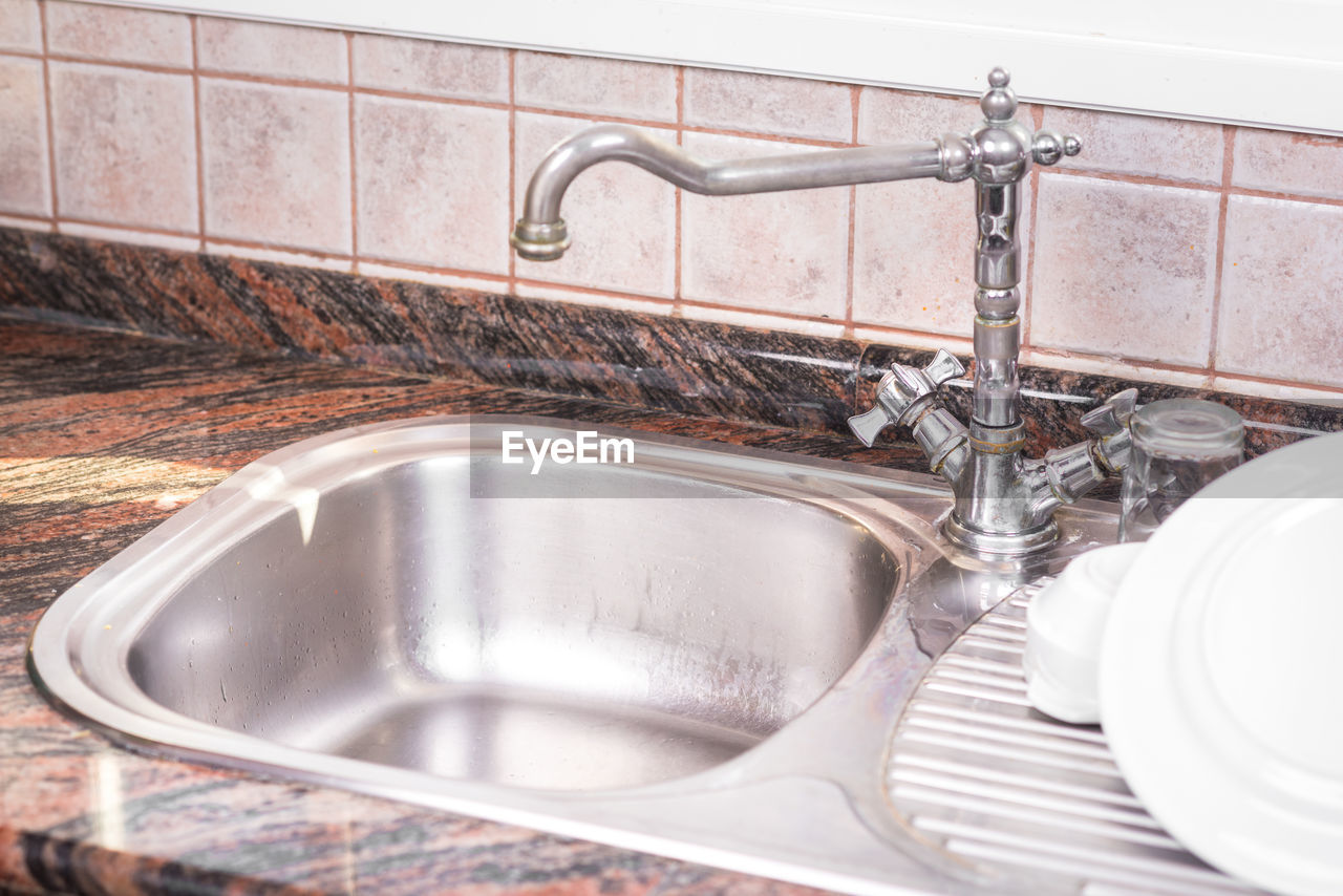 Faucet on sink in kitchen