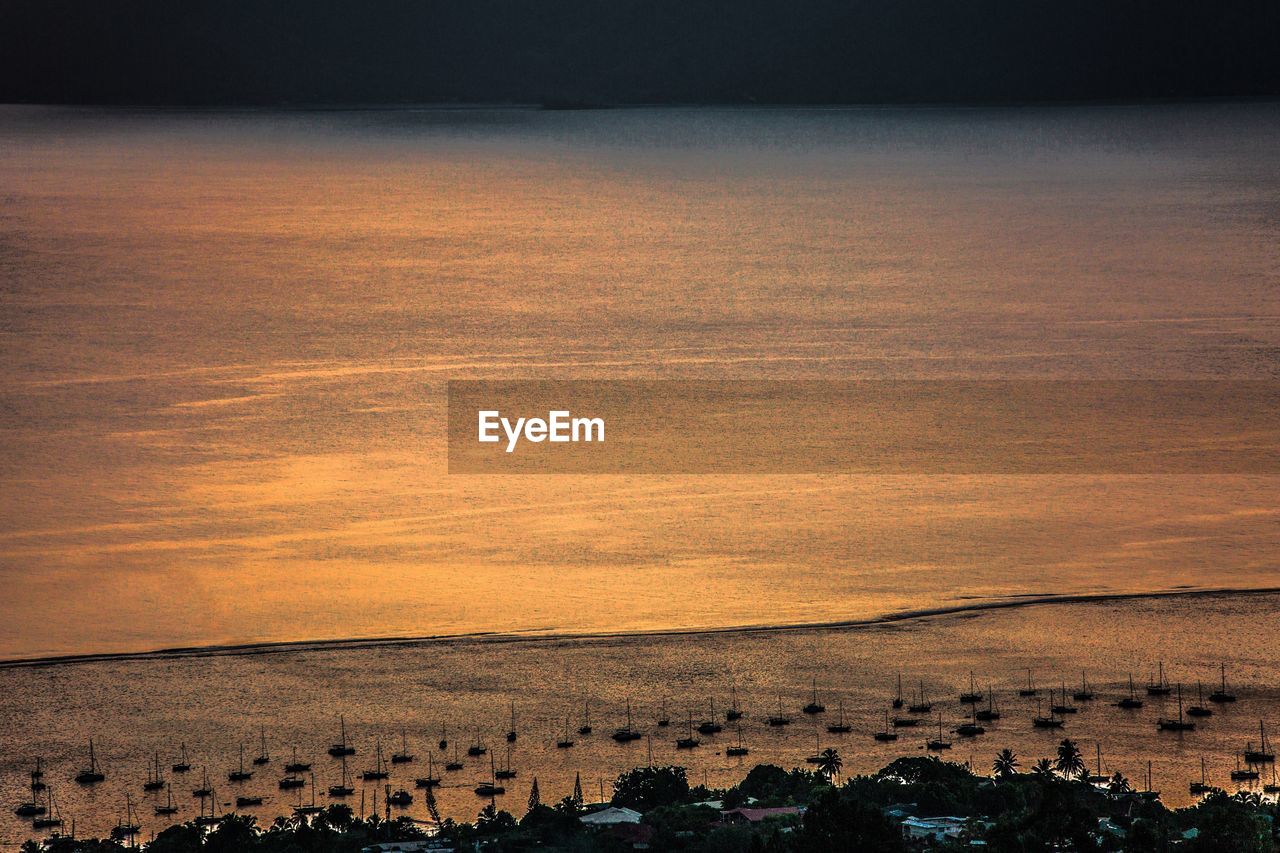 Scenic view of landscape at sunset