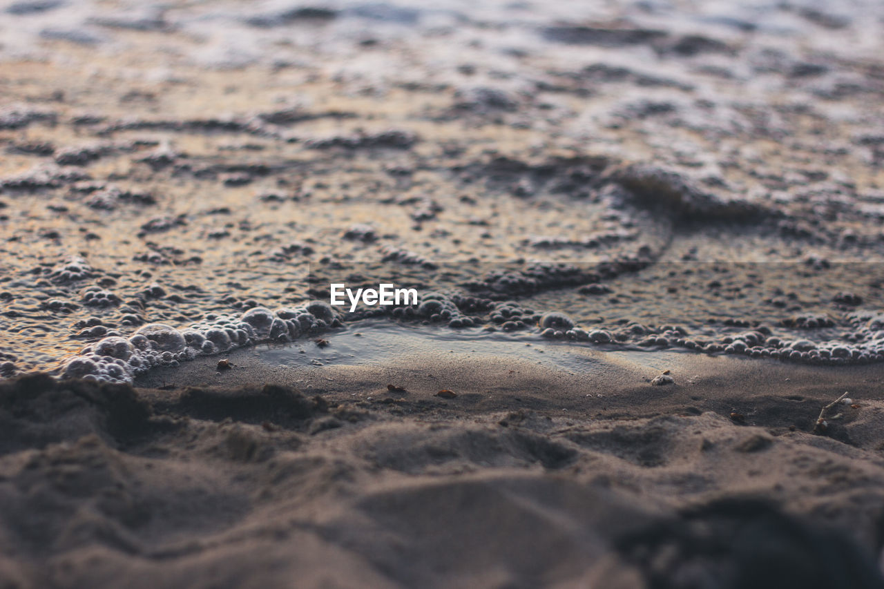 High angle view of sand at beach