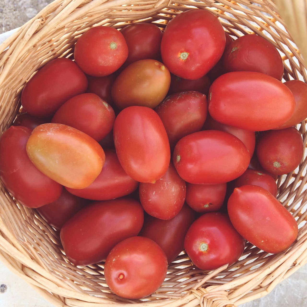 Basket with cherry tomatoes