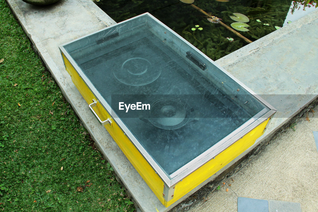 CLOSE-UP OF YELLOW OBJECT
