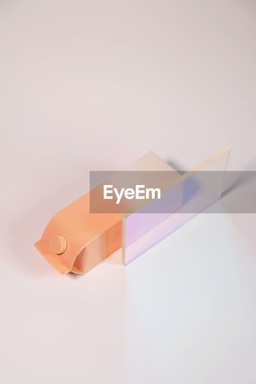 CLOSE-UP OF TOY ON WHITE BACKGROUND