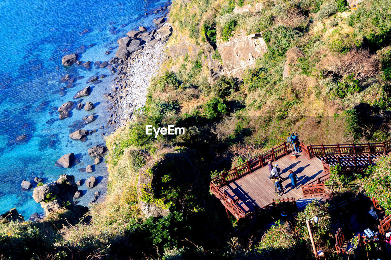 High angle view of viewing deck by sea against sky