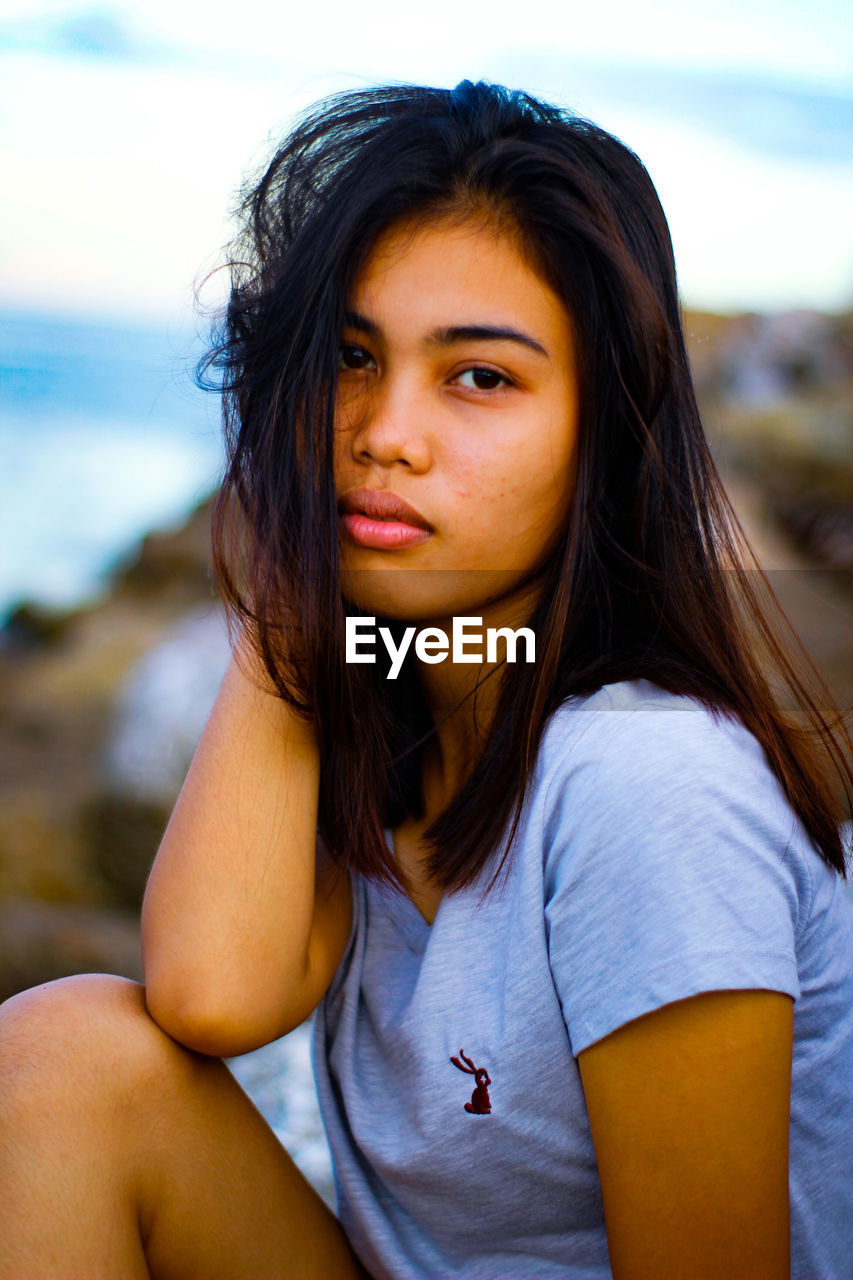 Portrait of beautiful woman at beach