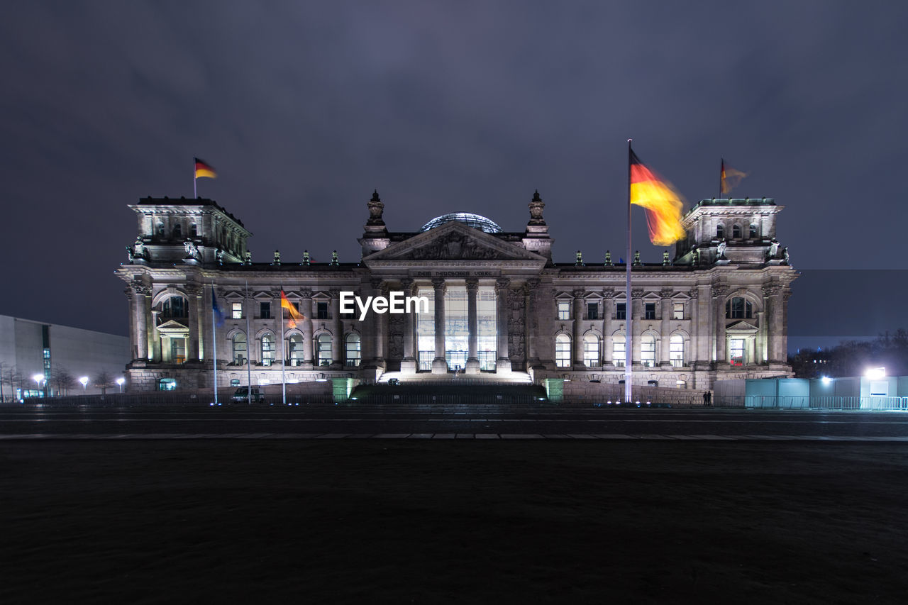 VIEW OF BUILDING AT NIGHT