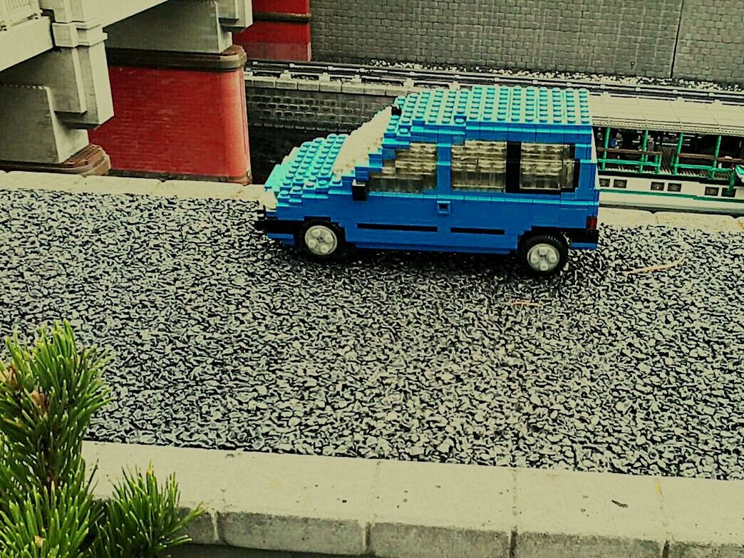 VINTAGE CAR ON COBBLESTONE