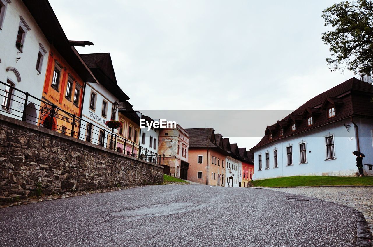 ROAD LEADING TOWARDS BUILDINGS