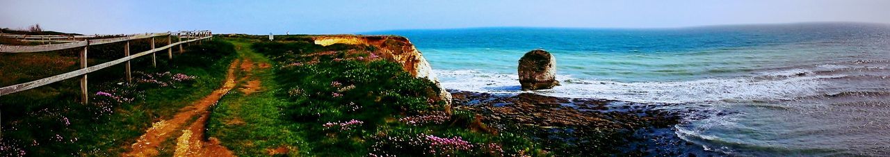 PANORAMIC VIEW OF BEACH AGAINST CLEAR SKY