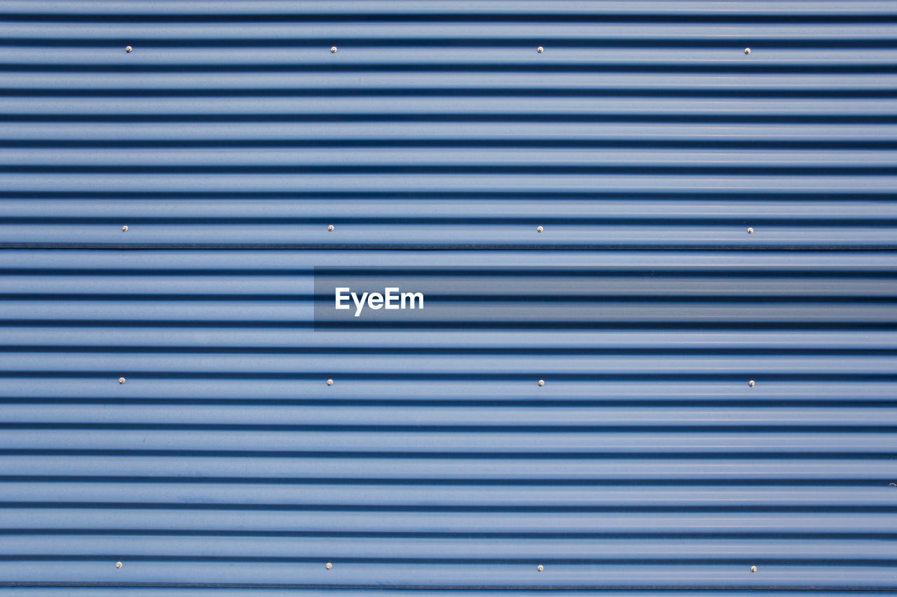 Full frame shot of blue corrugated iron