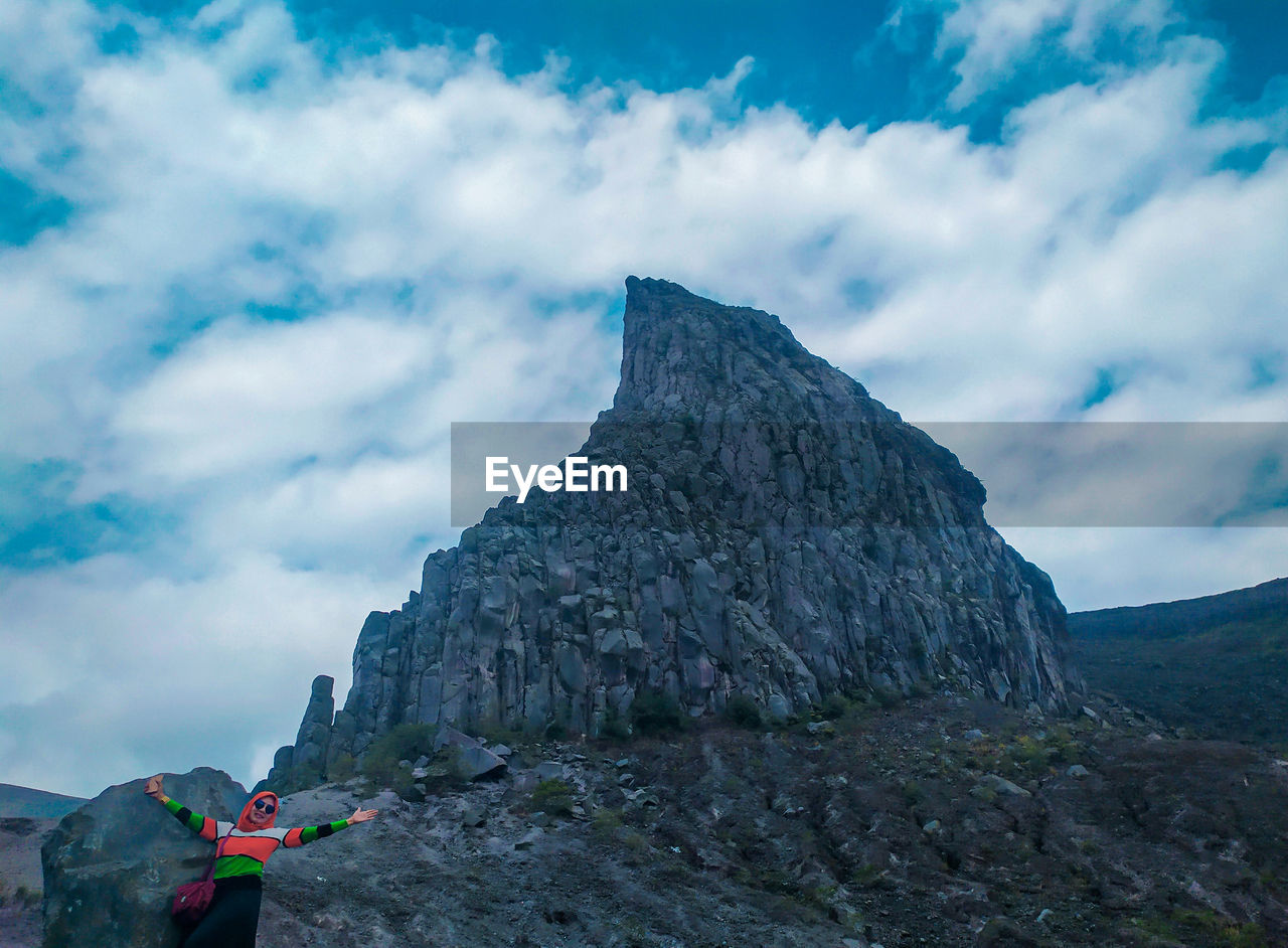 LOW ANGLE VIEW OF ROCKS AGAINST SKY
