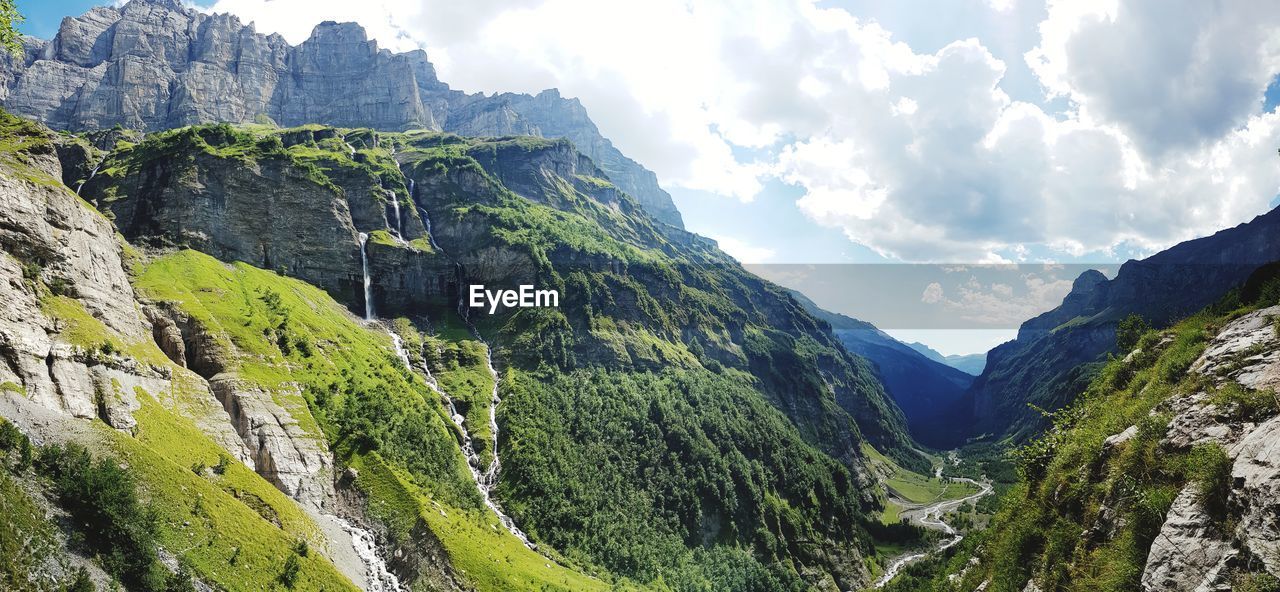 Panoramic view of landscape and mountains against sky