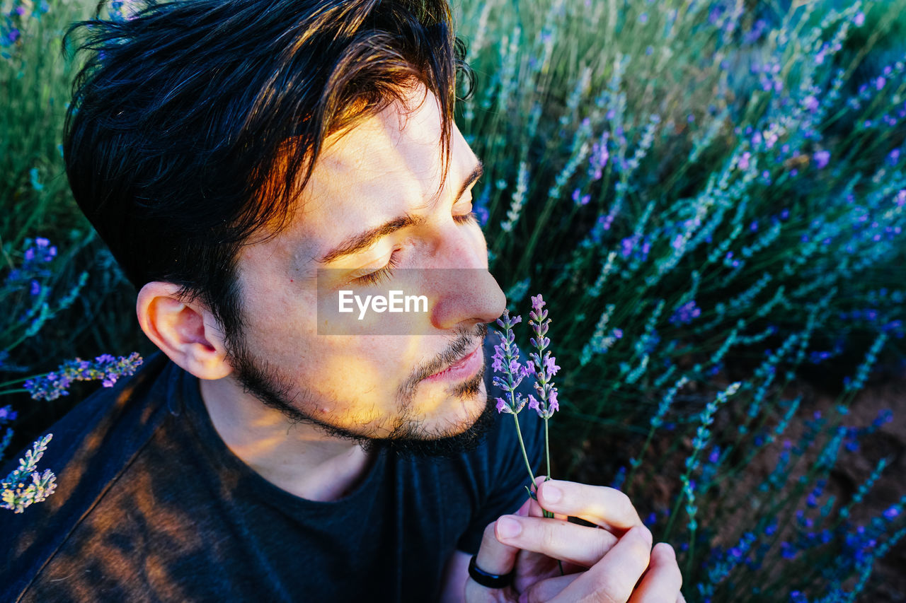 Close-up of man at field