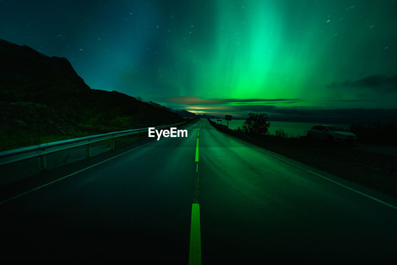 VIEW OF ROAD AT NIGHT