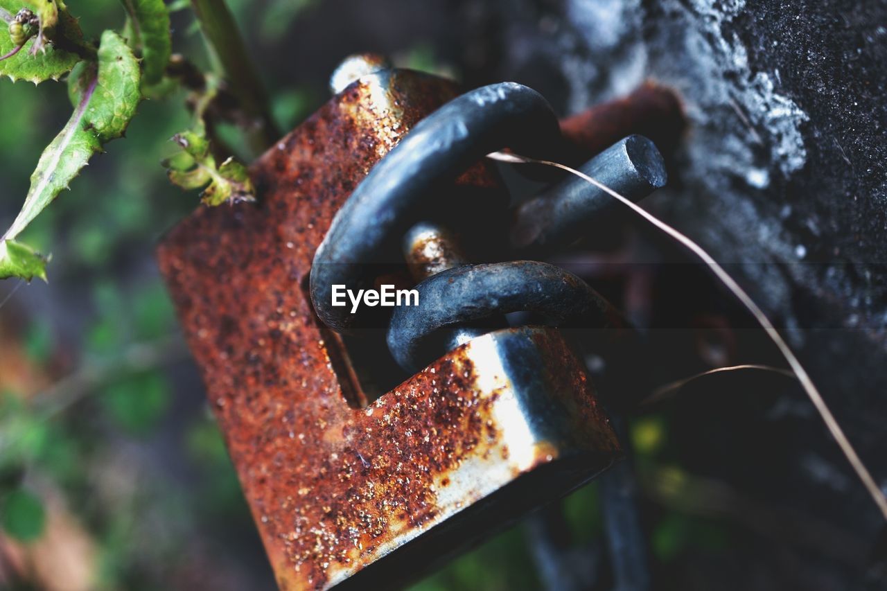 Close-up of rusty padlock