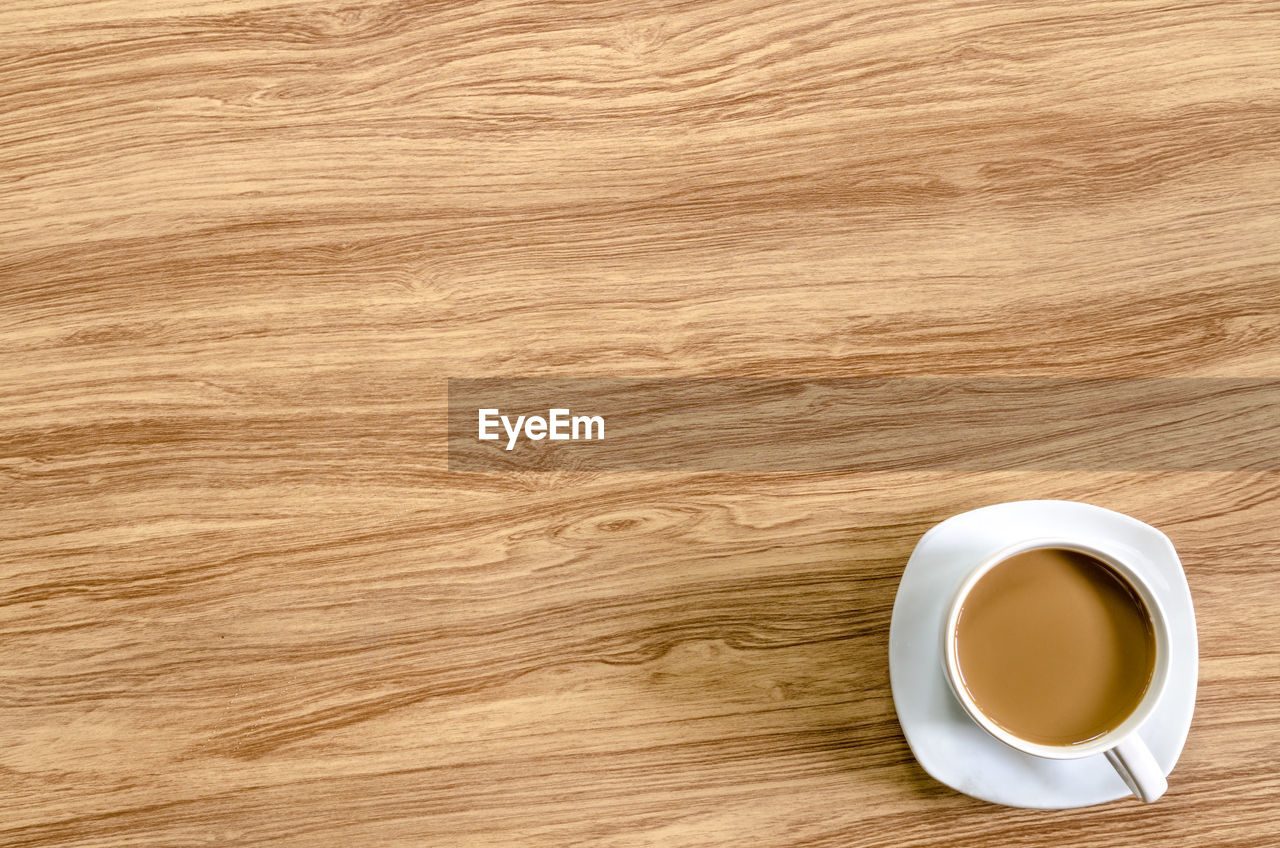 CLOSE-UP OF COFFEE ON TABLE