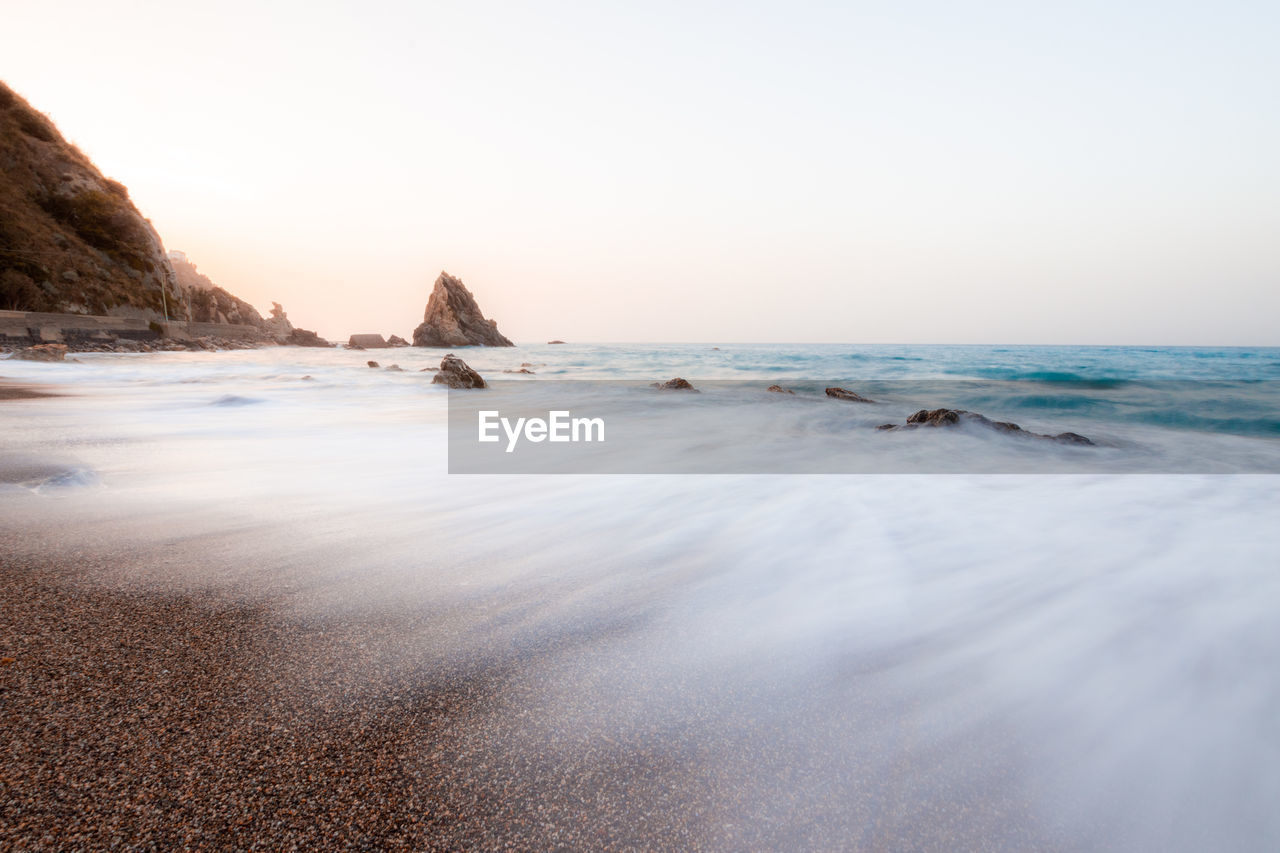 VIEW OF SEA AGAINST CLEAR SKY