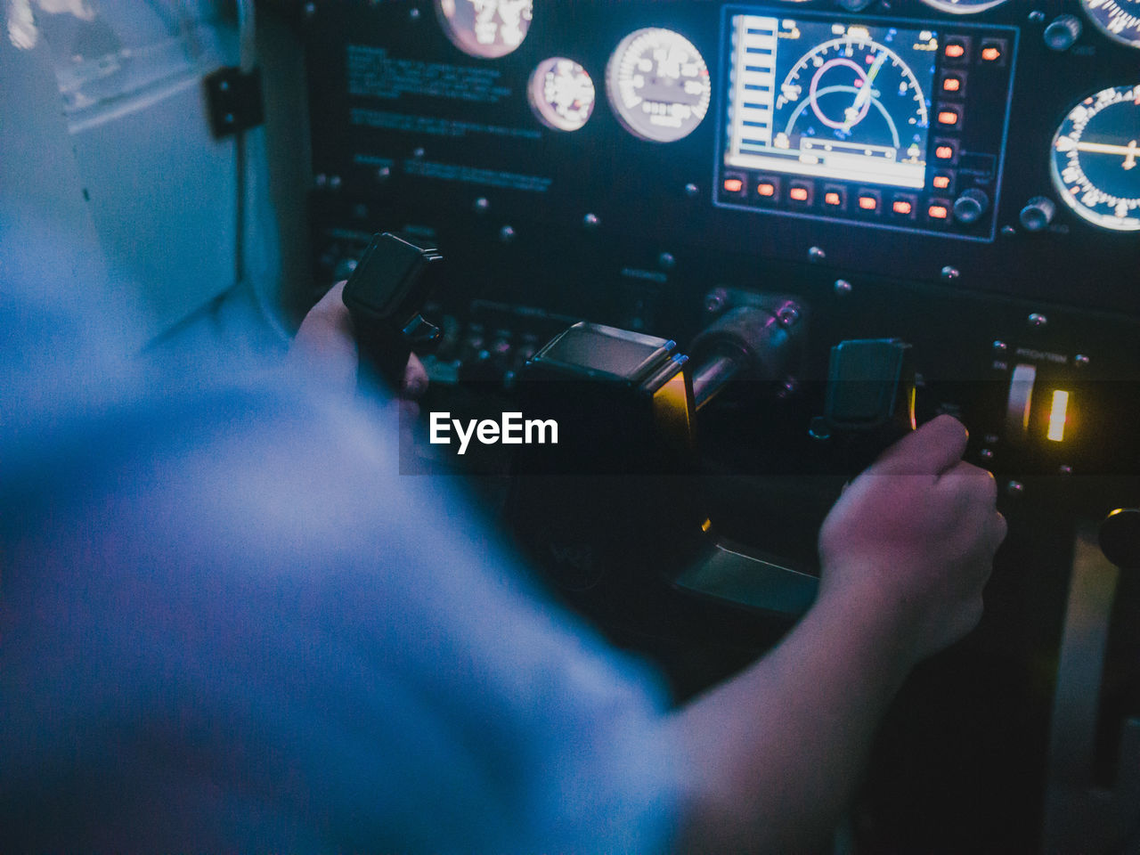 Cropped image of pilot in cockpit