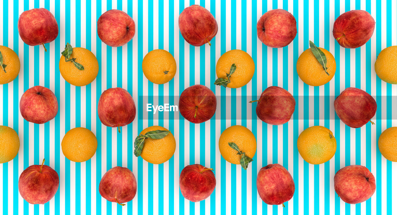 Directly above shot of fruits on colored background