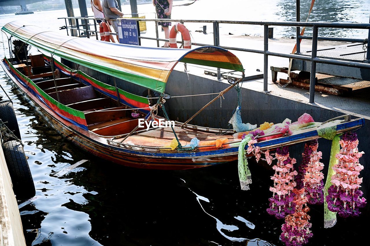 Traditional boat moored on river