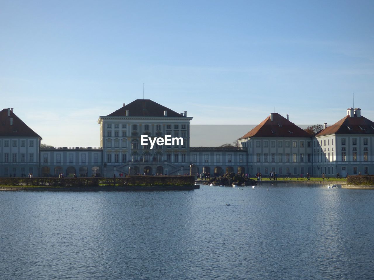 VIEW OF BUILDINGS BY RIVER