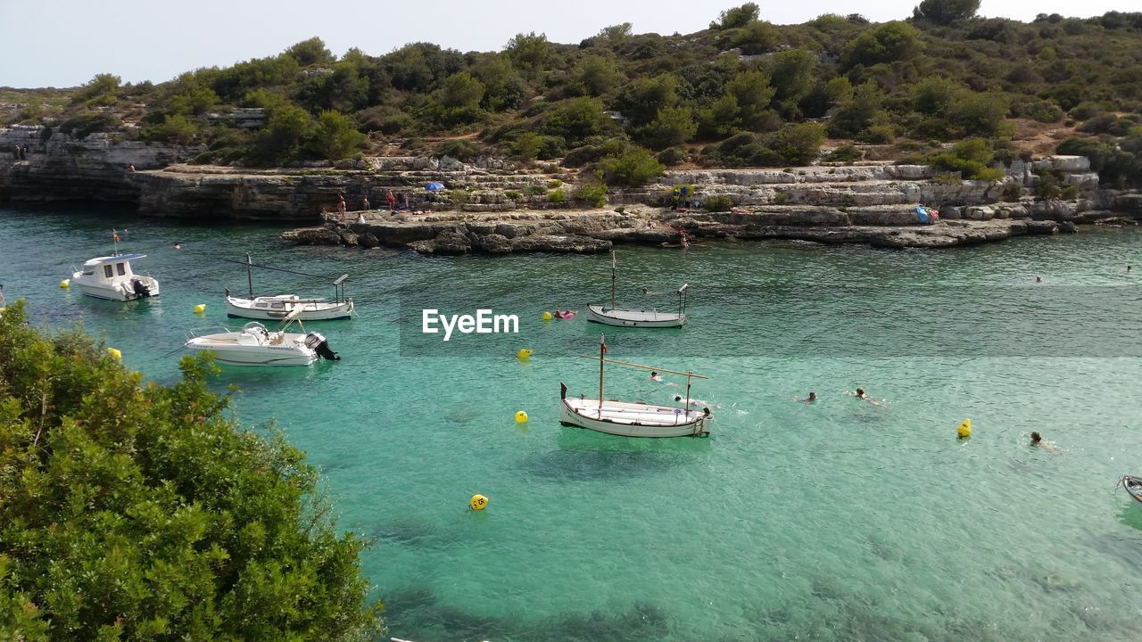 VIEW OF BOATS IN SEA