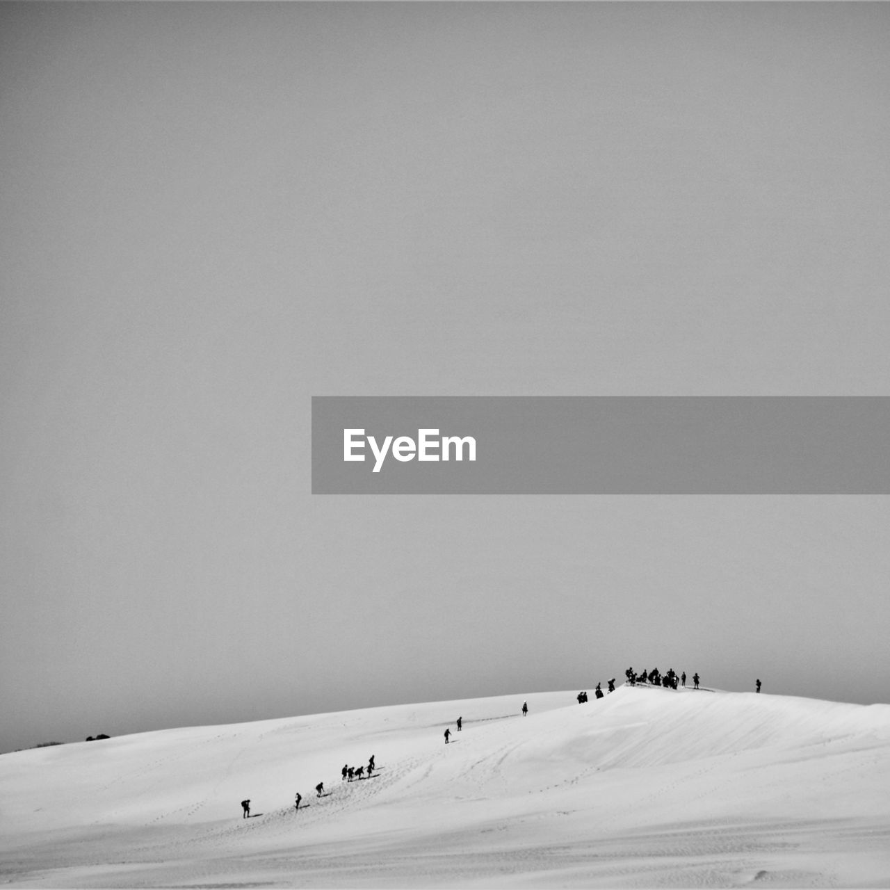 Scenic view of snow covered landscape against clear sky