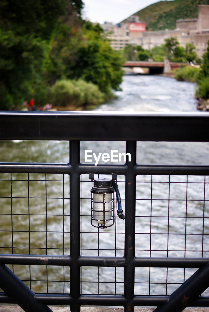 Lighting equipment on bridge over river