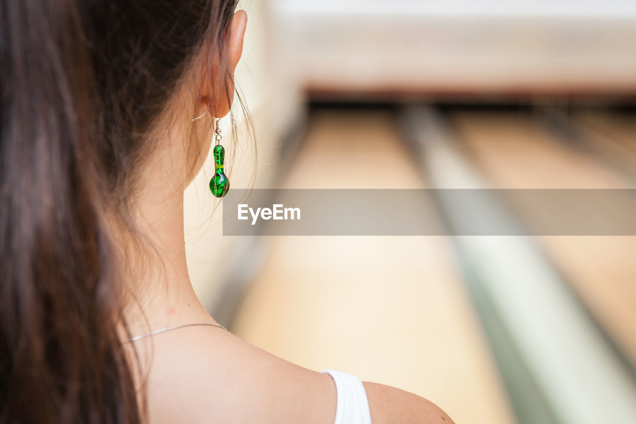 Close-up of woman wearing earrings