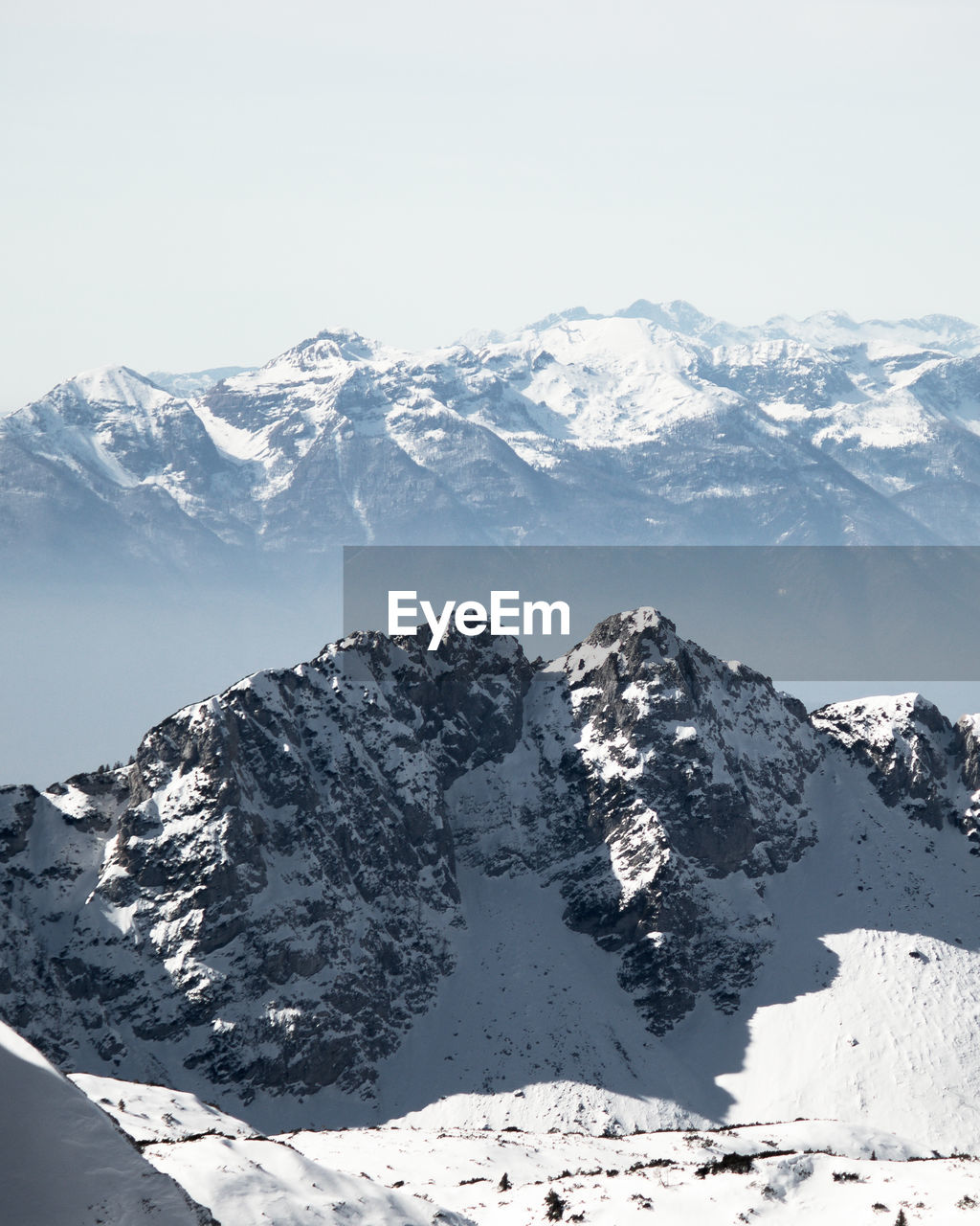 SNOWCAPPED MOUNTAIN AGAINST SKY