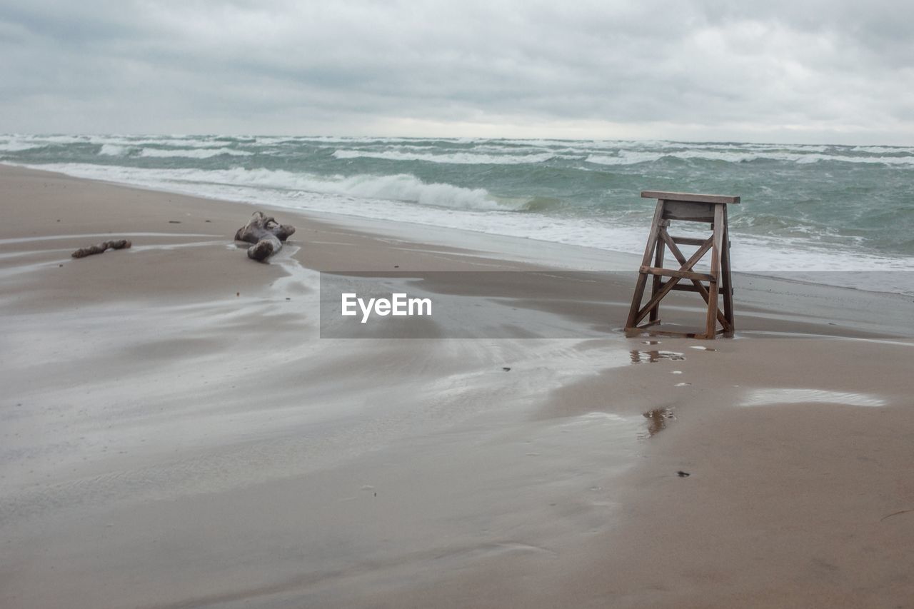 Scenic view of beach and sea against sky