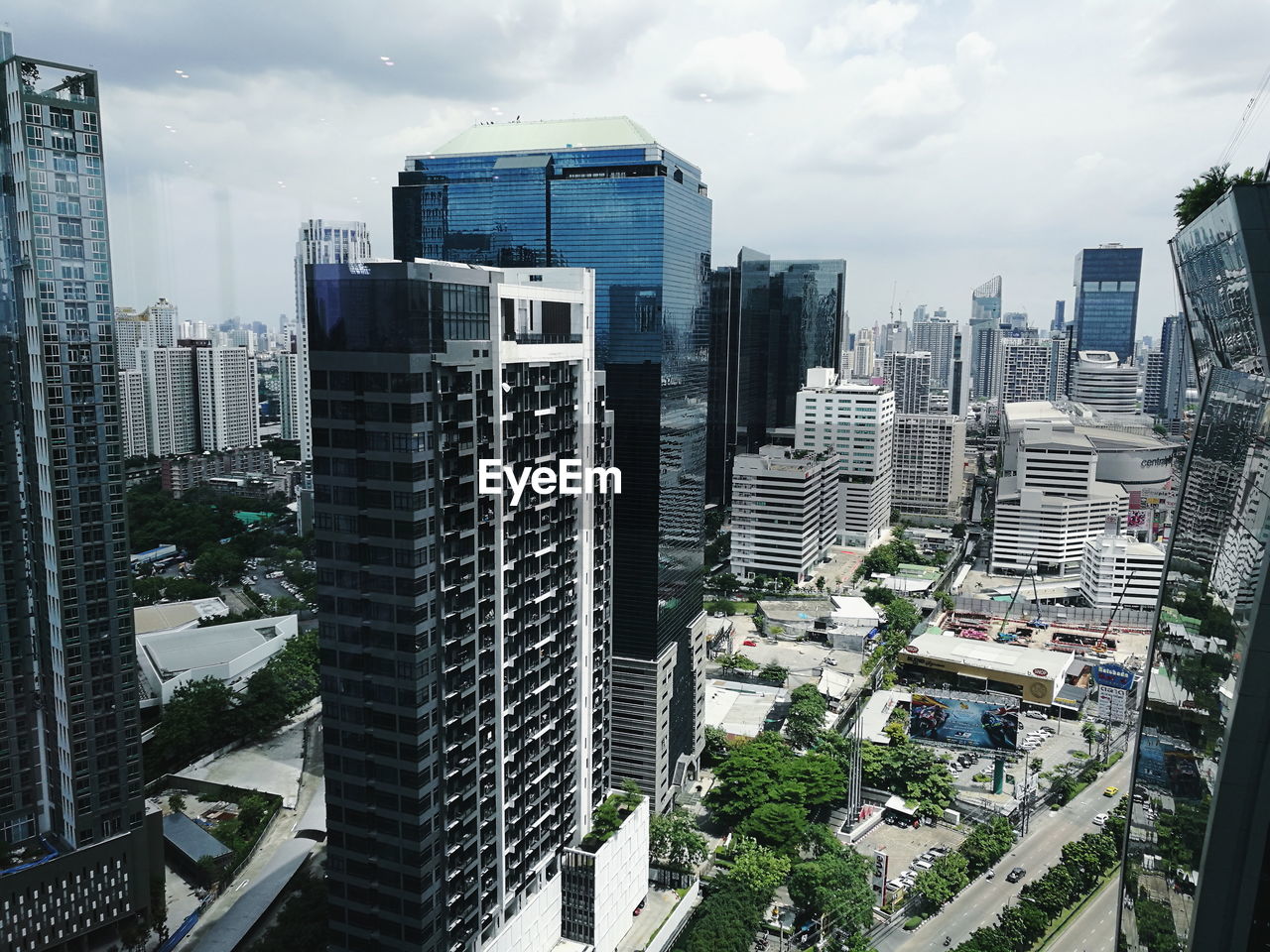 High angle view of buildings in city against sky