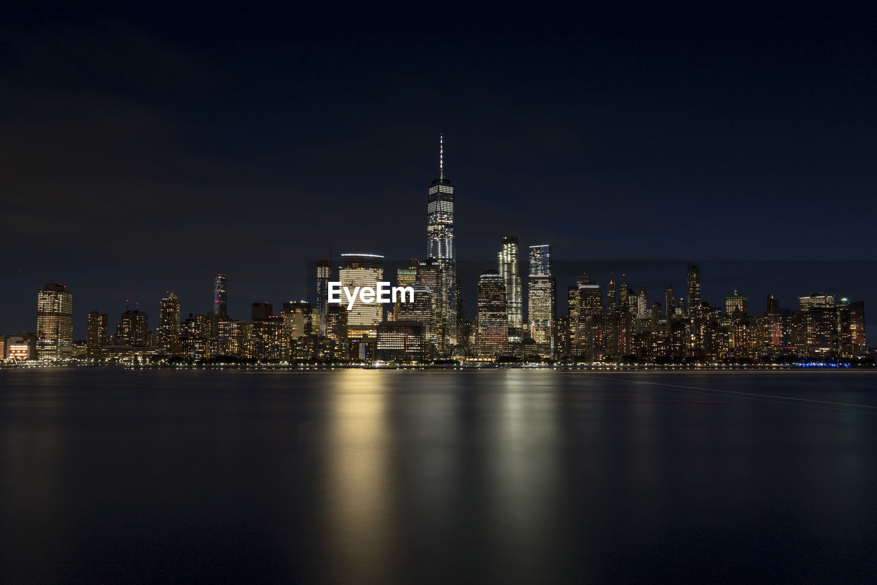 Illuminated buildings in city at night