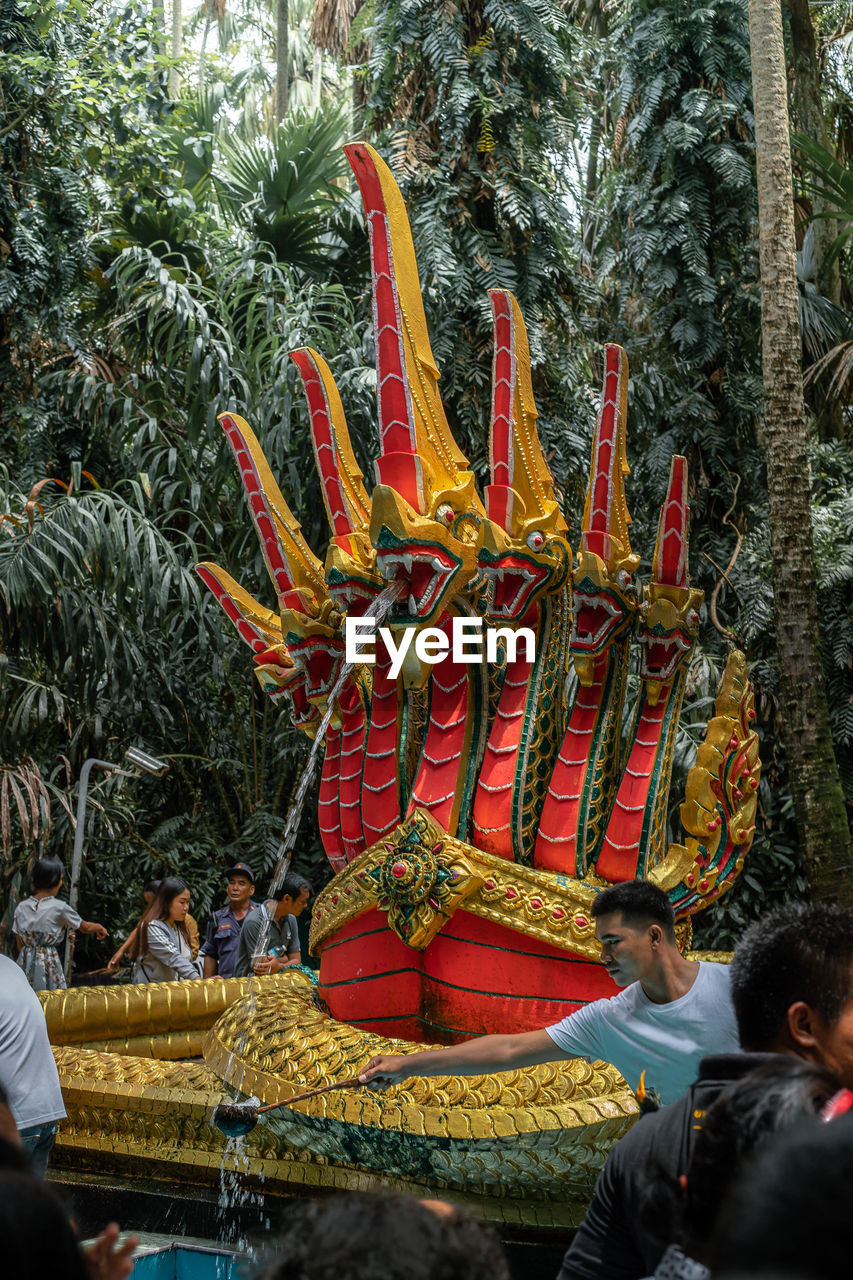 PEOPLE IN TRADITIONAL TEMPLE