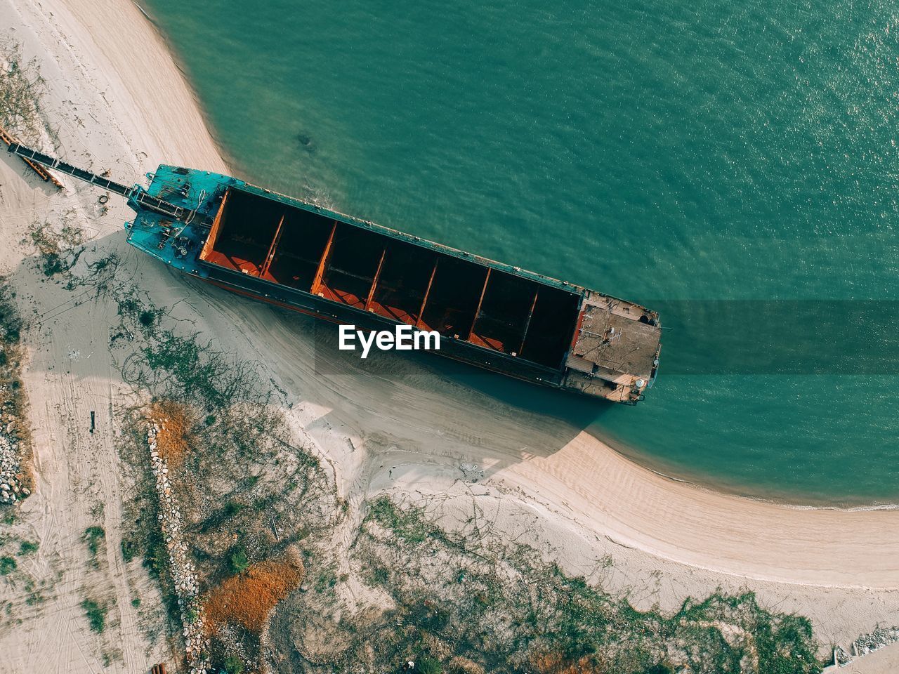 Aerial view of ship at shore