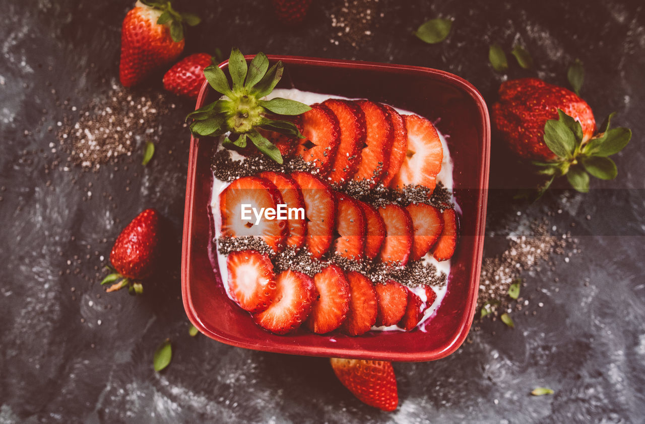 HIGH ANGLE VIEW OF STRAWBERRIES ON GRILL