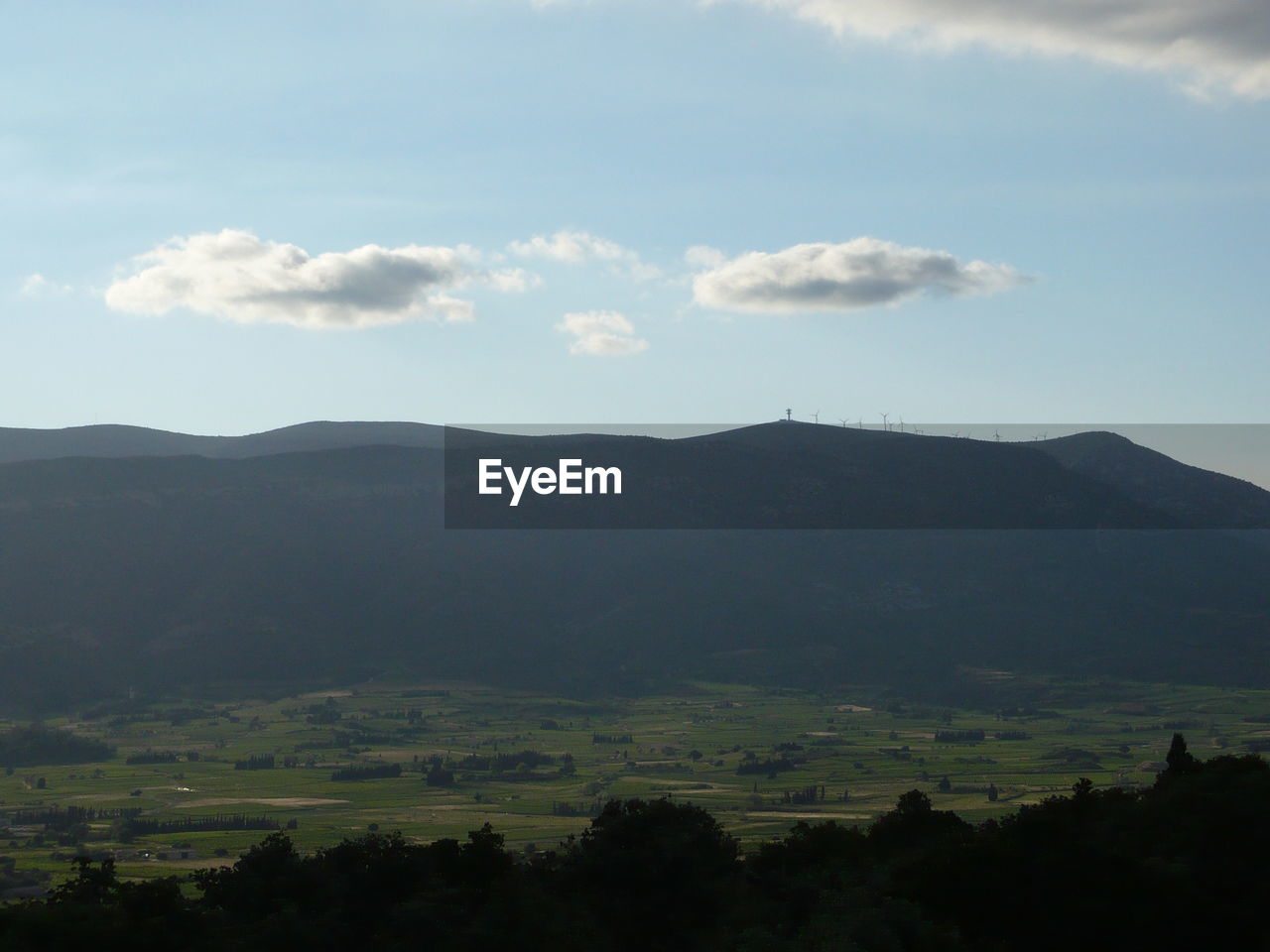 SCENIC VIEW OF SILHOUETTE LANDSCAPE AND MOUNTAINS AGAINST SKY