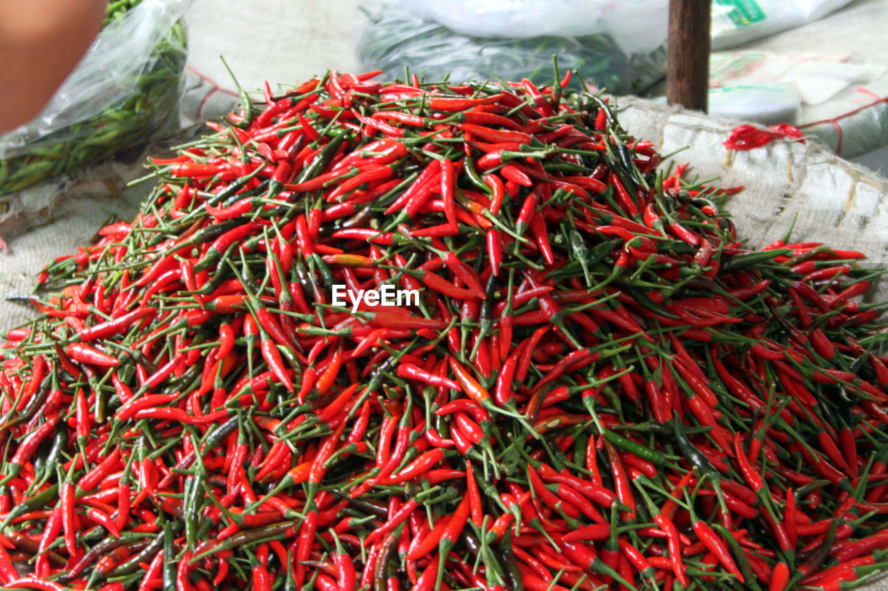 Close-up of red chili peppers for sale in market