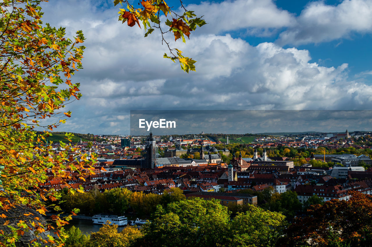 Aerial view of townscape against sky