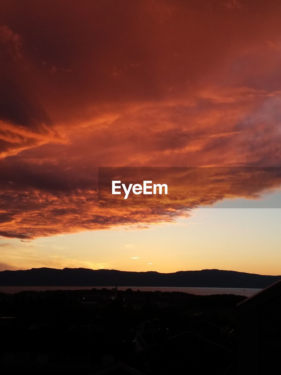 SILHOUETTE MOUNTAINS AGAINST SKY DURING SUNSET